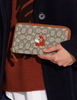 Coach Accordion Zip Wallet In Signature Jacquard With Fox Motif
