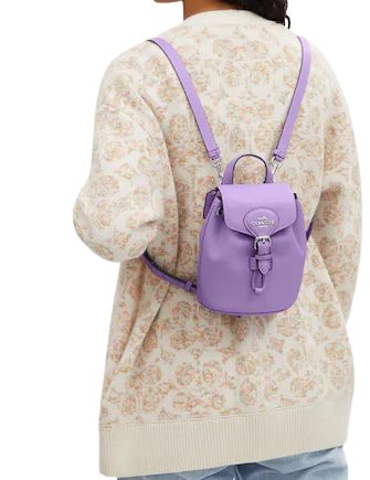 Purple top coach backpack