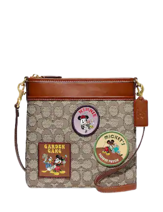 Disney x coach kitt messenger crossbody with patches Clearance