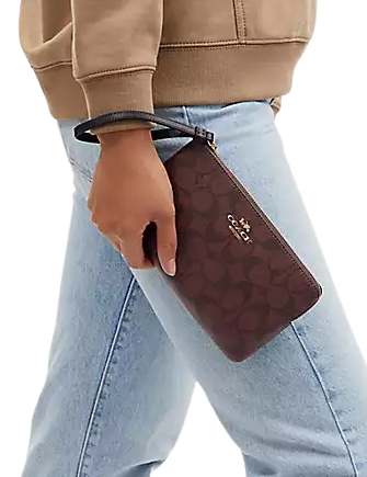 Coach Large Corner Zip Wristlet In Signature Canvas | Brixton Baker Coach Large Corner Zip Wristlet In Signature Canvas | Brixton Baker