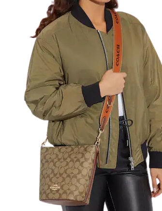 Coach Logan Duffle In Signature Canvas Brixton Baker