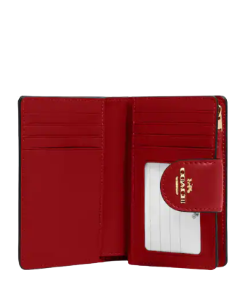 Coach Medium Corner Zip Wallet In Signature Canvas | Brixton Baker Coach Medium Corner Zip Wallet In Signature Canvas | Brixton Baker