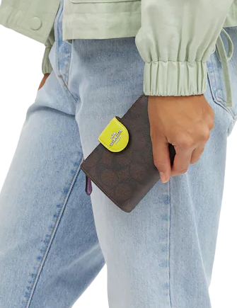 Coach Medium Corner Zip Wallet In Signature Canvas With Colorblock Interior