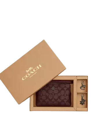 Coach Boxed Corner Zip Wristlet In Signature Canvas With Charms Wine