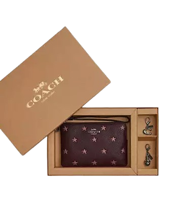 Coach Boxed Corner Zip Wristlet With Star Print And Charms Merlot
