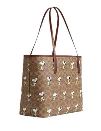 Coach Coach X Peanuts City Tote Bag In Signature Canvas With Snoopy Print  Tan Brown