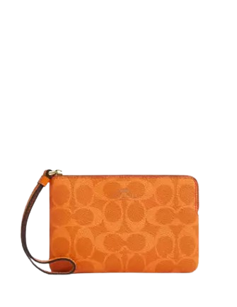 Coach Corner Zip Wristlet In Signature Canvas Bright Mandarin