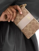 Coach Corner Zip Wristlet In Signature Canvas Tan Light Champagne