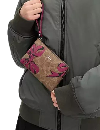 Coach Corner Zip Wristlet In Signature Canvas With Bow Print Tan Pink