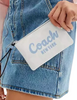 Coach Corner Zip Wristlet In Signature Canvas With Coach Script Chalk Bluebell