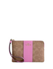 Coach Corner Zip Wristlet In Signature Canvas With Stripe Tan Fuchsia