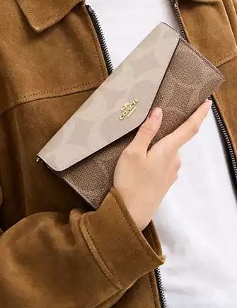 Coach Klare Wallet With Chain In Blocked Signature Canvas Sand Tan