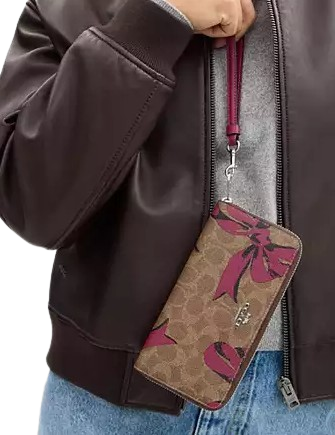 Coach Long Zip Around Wallet In Signature Canvas With Bow