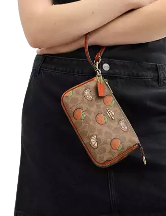 Coach Nolita 19 In Signature Canvas With Orange Print Tan