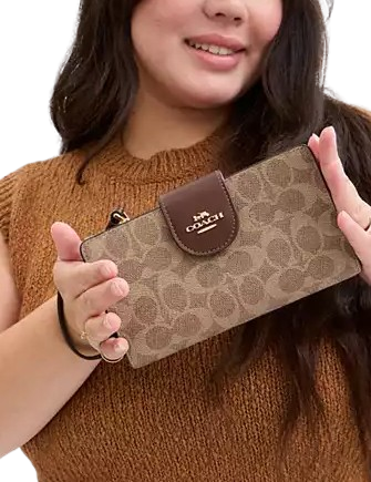 Coach large phone wallet in signature canvas outlet