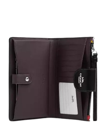 Coach Phone Wallet With Heart Bolt Print | Brixton Baker Coach Phone Wallet With Heart Bolt Print | Brixton Baker