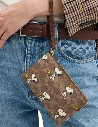 Coach X Peanuts Corner Zip Wristlet In Signature Canvas With Snoopy Print Tan Brown