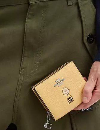 Coach X Peanuts Snap Wallet With Charlie Brown Hay