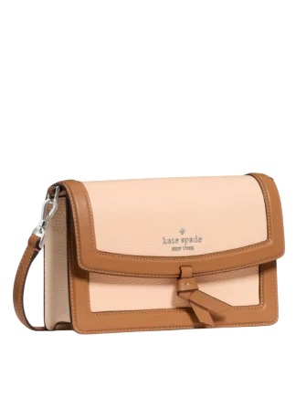 kate spade mini crossbody backpack 9 1/2 H X 7 W X 4D2 side pocketsFront zipper pocket3 card slotsInterior open pocketNylonZip closure Kate Spade New York Leila