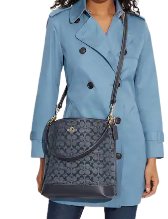 Coach charlie bucket 2024 bag in signature canvas