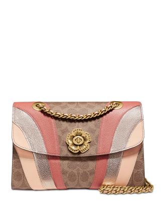 Coach purse with flower hot sale clasp