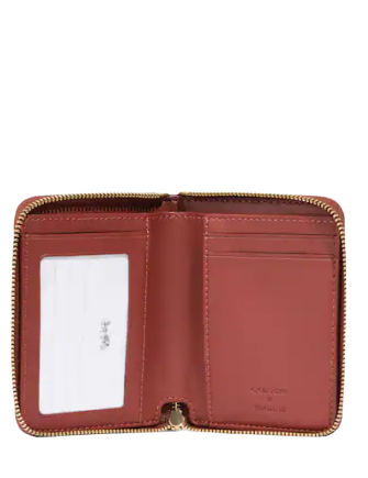 Coach Coach X Peanuts Small Zip Around Wallet In Signature Canvas With Snoopy Woodstock Print