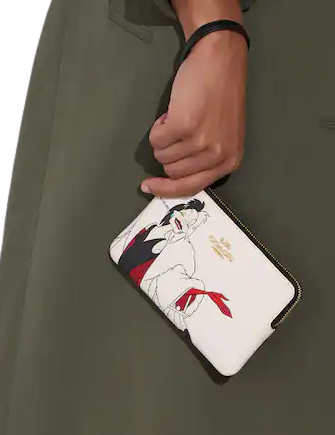 Coach Disney X Coach Corner Zip Wristlet With Cruella Motif