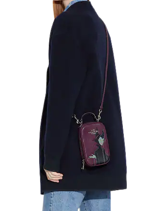 coach disney maleficent backpack x Box Crossbody With Motif Lunchbox Bag Purple Essex Fashion House cell phone and multifunction pockets Fabric lining Top handle with 2 1/2 drop Outside zip pocket Adjustable shoulder straps 12 1/2 (L) x 16 3/4 (H) x 6 (W) Part of a special collaboration where Disneys most iconic villains meet iconic Coach design Disney x Coach Disney Style No Maleficent Dragon Backpack