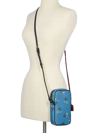 Sadie crossbody clutch with floral bow print discount
