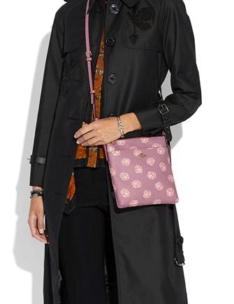 Coach rose print messenger crossbody hotsell