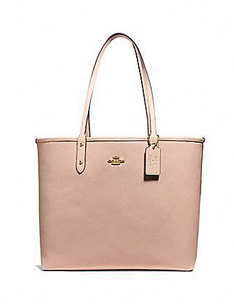 Minnie mouse city 2025 zip tote by coach