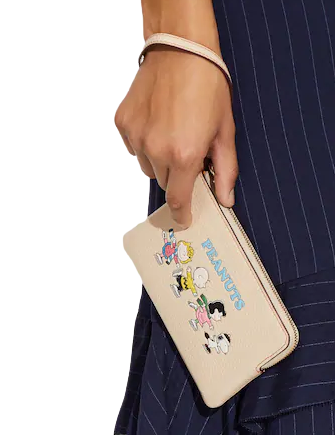 Coach X Peanuts Corner Zip Wristlet With Snoopy And Friends Motif