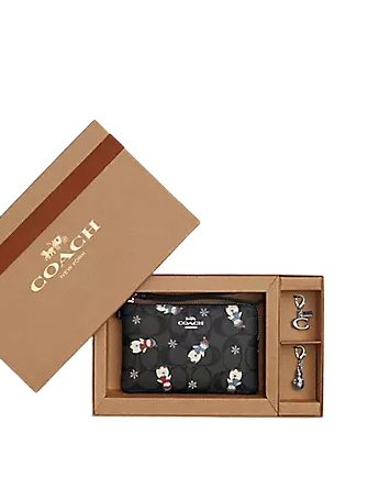 Coach Boxed Corner Zip Wristlet In Signature Canvas With Snowman Print