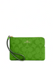 Coach Corner Zip Wristlet In Signature Canvas