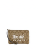 Coach Corner Zip Wristlet In Signature Canvas With Horse And Sleigh
