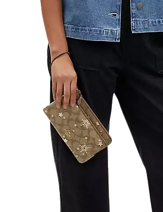 Coach Double Zip Wallet In Signature Canvas With Star And Snowflake Print