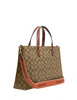 Coach Logan Carryall In Signature Canvas