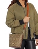 Coach Logan Duffle In Signature Canvas