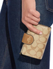 Coach Medium Corner Zip Wallet In Signature Canvas