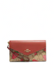 Coach Travel Envelope Wallet In Signature Canvas With Wild Strawberry Print