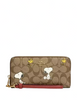 Coach Coach X Peanuts Long Zip Around Wallet In Signature Canvas With Snoopy Woodstock Print