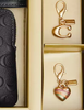 Coach Boxed Corner Zip Wristlet In Signature Leather Black