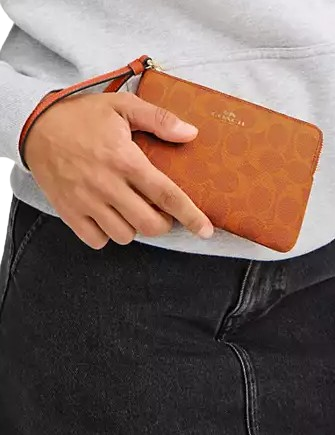 Coach Corner Zip Wristlet In Signature Canvas Bright Canyon