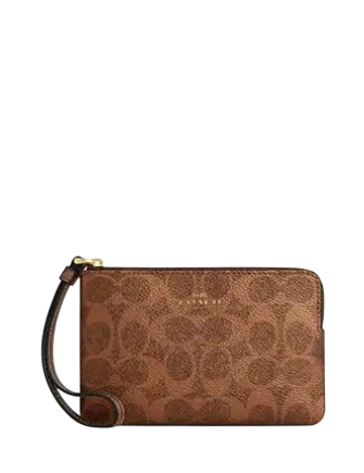Coach Corner Zip Wristlet In Signature Canvas Brown Copper