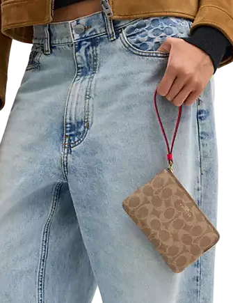Coach Corner Zip Wristlet In Signature Canvas Tan Carnation