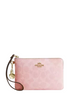  Coach Corner Zip Wristlet In Signature Canvas With Charms Powder Pink