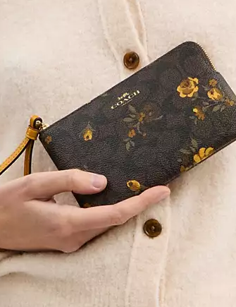 Coach Corner Zip Wristlet In Signature Canvas With Floral Print Walnut Yellow