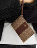 Coach Corner Zip Wristlet In Signature Canvas With Stripe Tan Brown