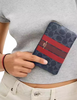 Coach Corner Zip Wristlet In Signature Canvas With Varsity Stripe Denim Bold Red