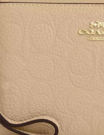 Coach Corner Zip Wristlet In Signature Leather Oat